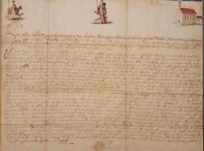 Bild: alte handschriftliche Urkunde mit Zeichnungen